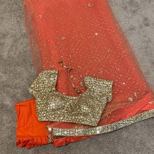 Coral Saree with gold blouse Indian outfit